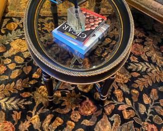 Oval ebony and gilt coffee table