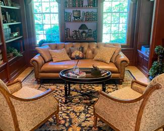 Great rug and chesterfield sofa