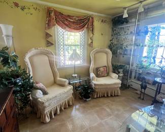 Pair of high back upholstered chairs