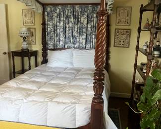 Plantation bed. Heavily carved. Gifted to a plantation worker at the death of the plantation owner.