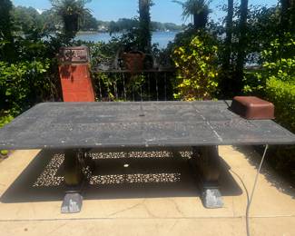 Large metal table, poolside, for entertainment