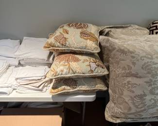 LOTS of designer bedding, pillows and window treatments.  