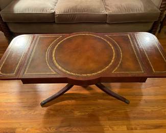 Inlaid leather coffee table, which is drop leaf! $90