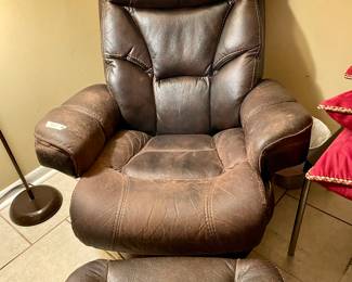 Comfy Chair and Ottoman Set $100. Some wear and tear but you can condition it. 