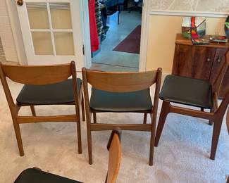 Mid Century Modern Danish Teak Wood Dining Table with 6 Chairs - Includes One Leaf and Pads $3000.00