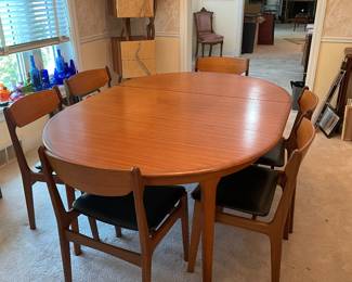 Mid Century Modern Danish Teak Wood Dining Table with 6 Chairs - Includes One Leaf and Pads $3000.00