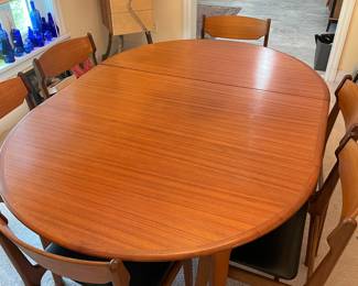 Mid Century Modern Danish Teak Wood Dining Table with 6 Chairs - Includes One Leaf and Pads $3000.00
