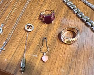 Gold pieces… 14k hat pin w/ jewel… 10k ornate ring around a size 8, 14k solid gold twisted ribbon ring… antique? 14k good and carved corral heart pendant or charm. 