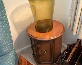 large glass vase, circular cabinet