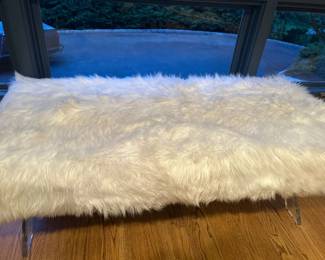 Fur bench with lucite legs