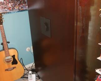 35      Armoire  Front  has  decorative  handle             Price  is  275.00  size  is    36  x   53     Has many shelves inside  for  clothes