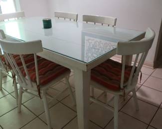 43             shabby  chic    kitchen  table.  There are  6  chairs and  has  a  glass  top   It  is 3'  x  4'    Price  is  275.00