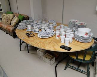 Blue and white place setting, along with that hand made oval table again, with matching chairs