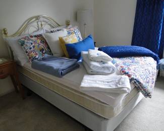 Pillows, blankets, and mattress protector, along with throw and comforter too