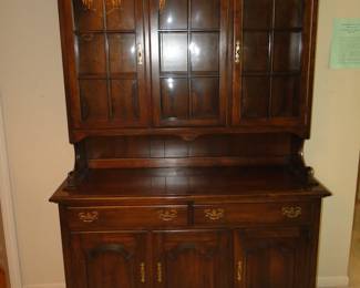 This hutch is just a little different with the wavy glass front. Would make an outstanding project piece