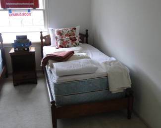 Not just one, but two twin beds, complete with all the trimmings, which are sold seperately