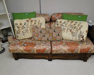 Vintage loveseat, with lots of decorative pillows