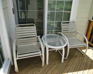 We have two very comfortable chairs, and table. Perfect trio for relaxing with a drink