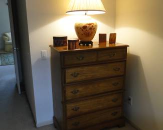 Nice tall dresser with plenty of storage in each of the five drawers