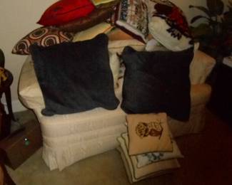 Love Seat covered with Pillows