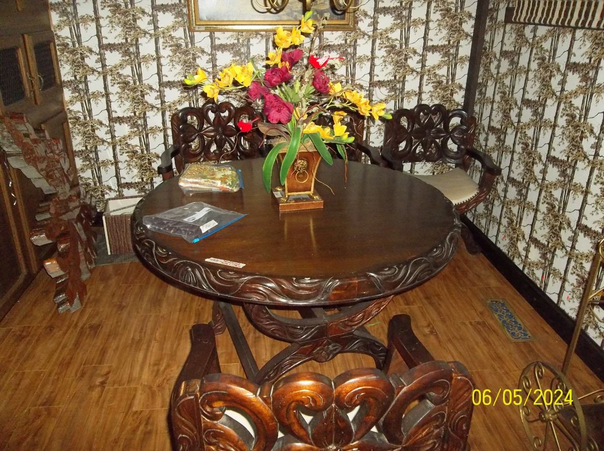 Hand carved dining table and chairs 