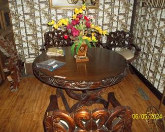 Hand carved dining table and chairs 