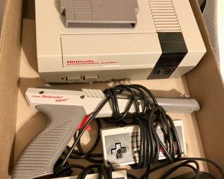 Original NES system with 2 controllers, gun, and original game