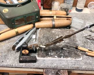 Two jewelry makers benches with many tools, Dremels, etc