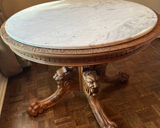 Hand carved and custom made antique table with marble top