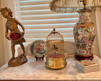Antique rare and highly collectible fully animatronic bird in cage. Fully functional and in excellent condition.