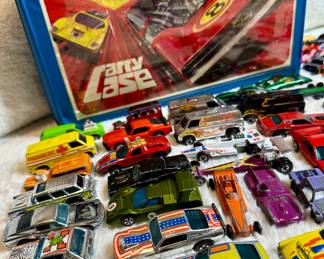 Vintage and original Redline Hot wheels toy cars, as well as other vintage Hot Wheels cars.