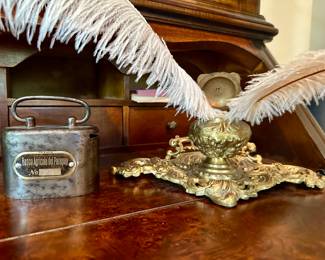 Feather pin and ink, antique piggy bank