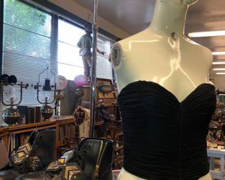 Iconic Loris Azzaro black top. Louis Vuitton sneaker new with receipt and box.