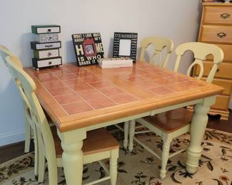 Tile top table with 2 leaves and 4 chairs