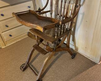 unusual wooden child's high chair 