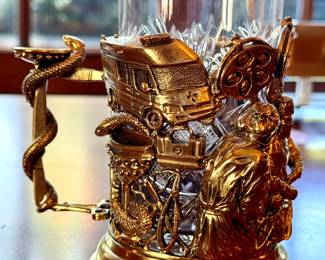 Cast brass, glass holder. Surgeons edition. $400. 