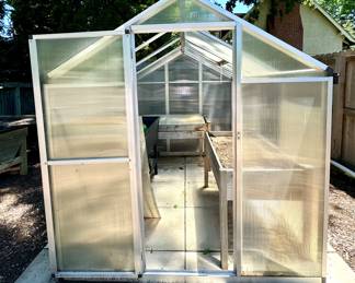 SOLD Greenhouse shed (stones included)- (as is). Corrugated plastic sides and roof. Missing pieces are accounted for.  You disassemble and you move - - 99x70x77  (6 x 8) 