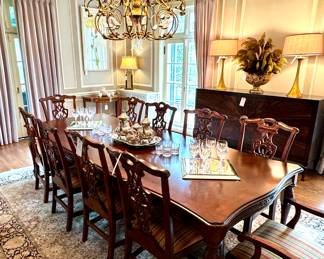 Dining room table with turned legs and fretwork - $650 - 74x45x30, 2 leaves at 18 inches each; Chippendale style dining armchairs with plaid cushion by Bassett (2 available) - $200 (each) - 24.5x19x41; Chippendale style dining side chair by Bassett with plaid cushion (8 available) - $100 (each) - 21.5x19.5x41 