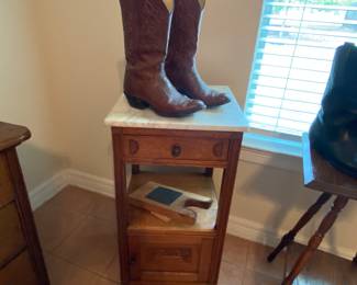 Cowboy Boots and a Marble Top Side Table