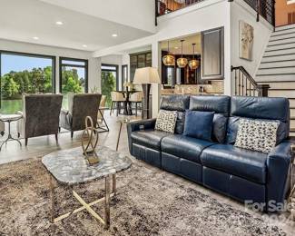 Navy leather recliner sofa by Omni