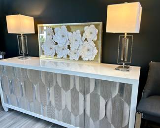 White/silver credenza 80” by 20” deep by 35” high, pair of matching lamps