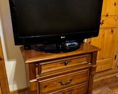 Small chest to match Queen Size bed may be used as a nightstand.