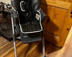 High chair with tray (not shown)