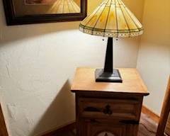 Stain glass lamp and end table.night stand.  Longhorn wall art