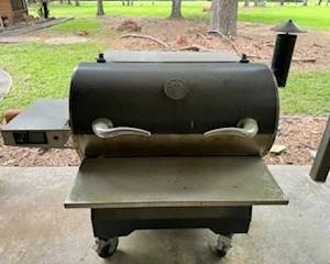 Recteq Grill, stout.  Two to move!