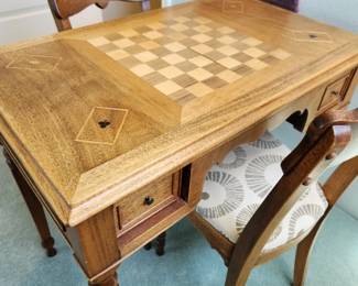 A sweet Game Table with two Chairs. 