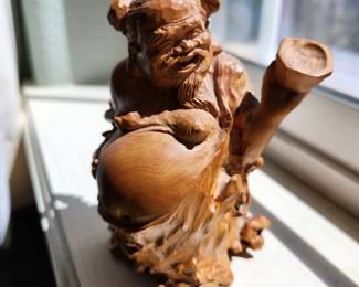 Several carved Asian Figures 