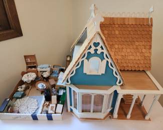 Dollhouse and furniture sold together