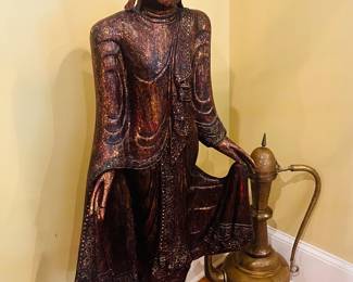 Carved wood Buddha on stand