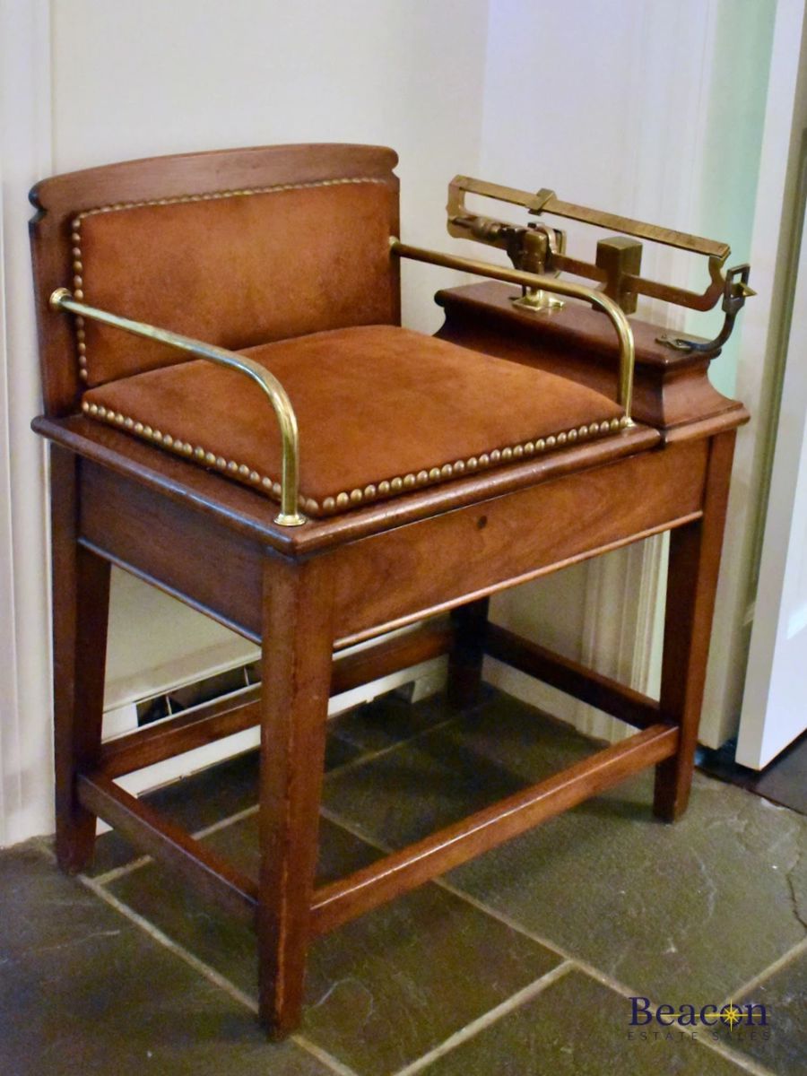 Antique jockey chair scale.